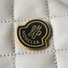 Moncler 徽标绗缝皮革链条单肩包（米色/黑色）