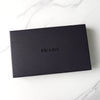 Prada nylon bifold wallet with triangle logo in black