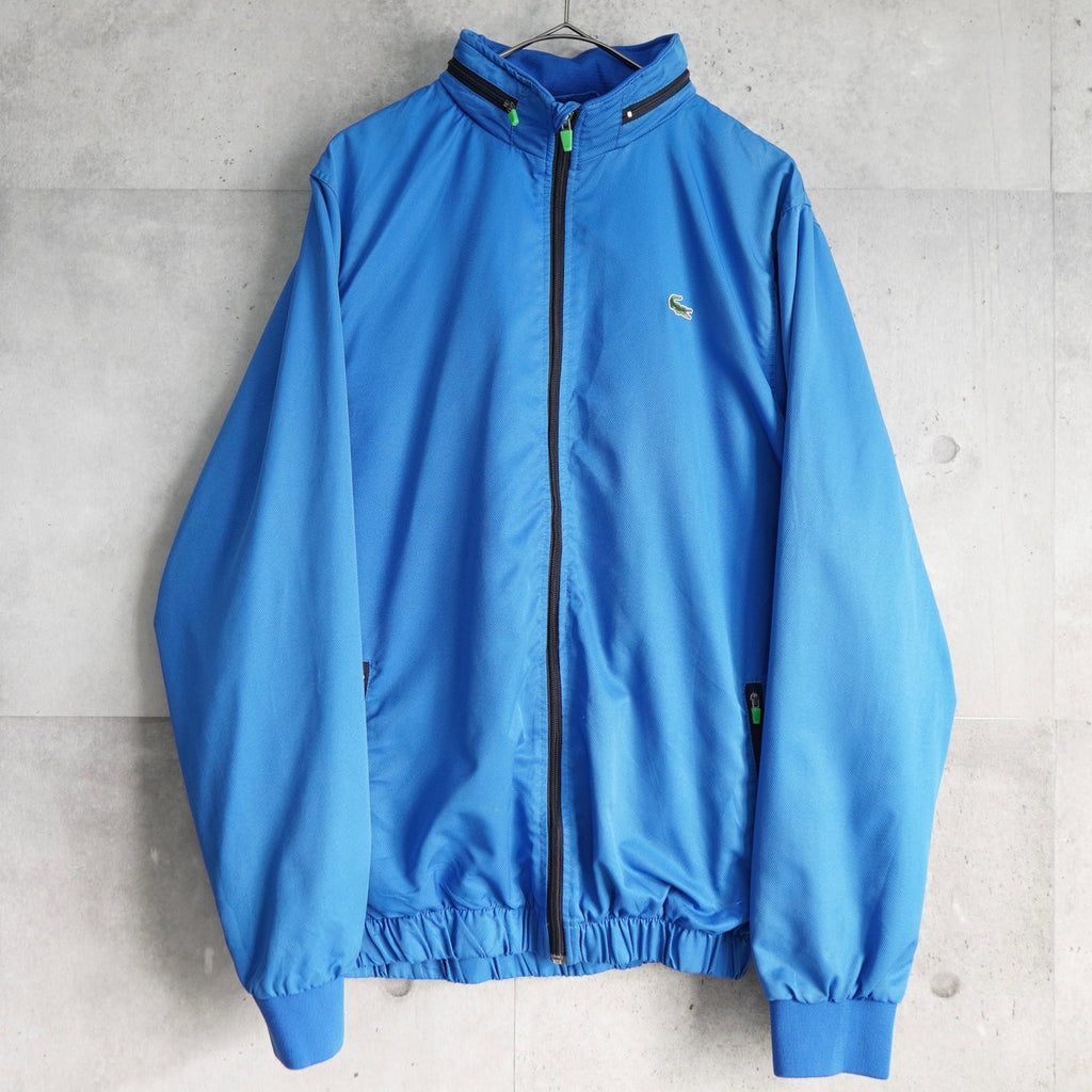 ラコステ ナイロンジャケットトラックジャケット ロゴパッチ ブルー