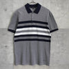 Gucci logo embroidered short sleeve polo shirt in navy/gray