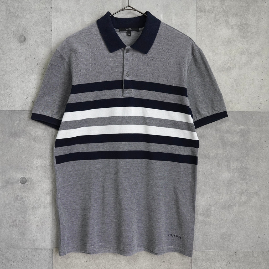 Gucci logo embroidered short sleeve polo shirt in navy/gray