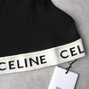 Celine logo tube top in black, unused with tags