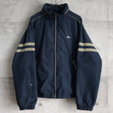 ラコステ スポーツ バイカラー ナイロンジャケット ブルゾン ロゴパッチ ネイビー/グレージュ - NEWSED