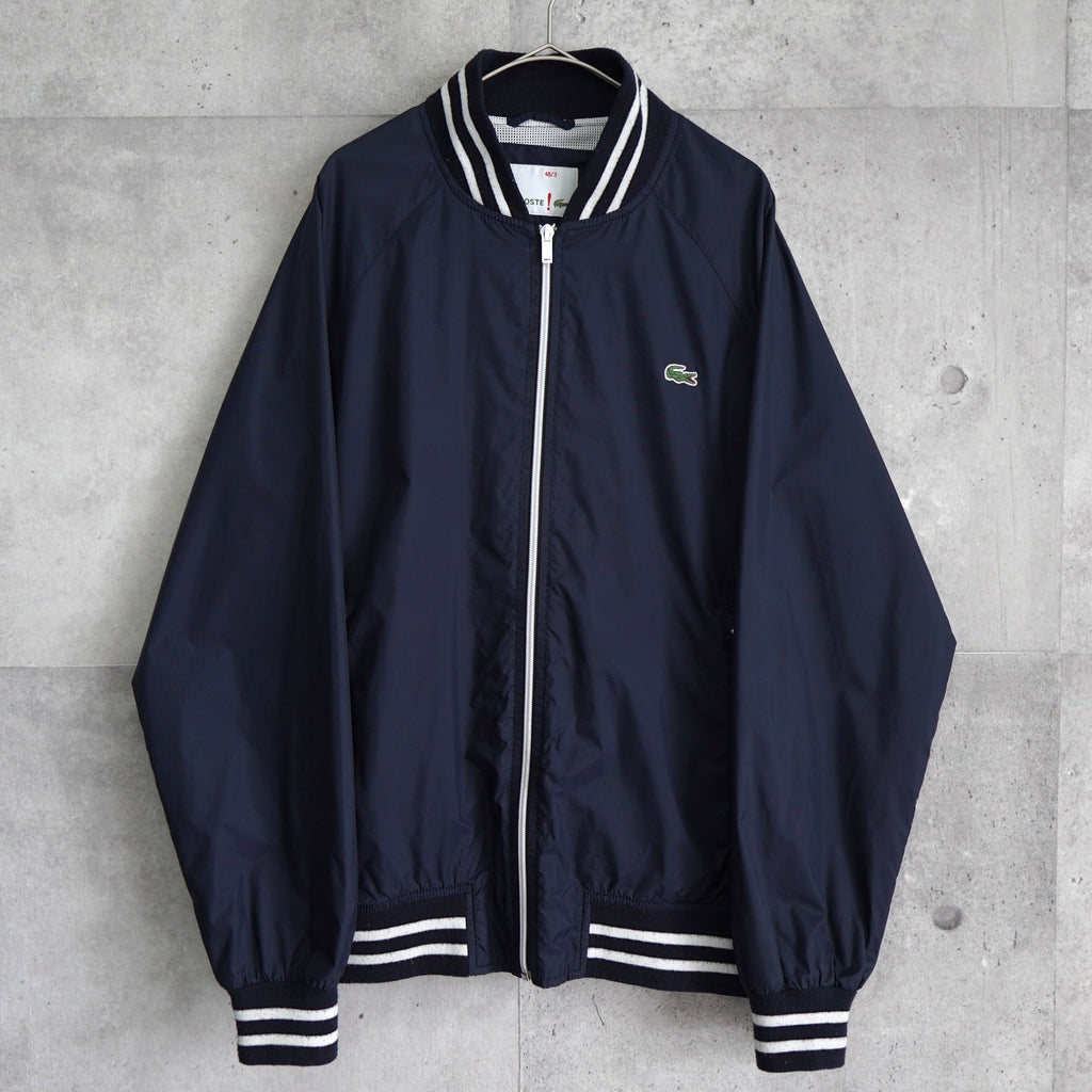 ラコステ ナイロン スタジャン ブルゾン ロゴパッチ ネイビー