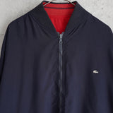 ラコステ ヴィンテージ リバーシブル スタジャン ブルゾン ロゴパッチ ダークネイビー/レッド - NEWSED