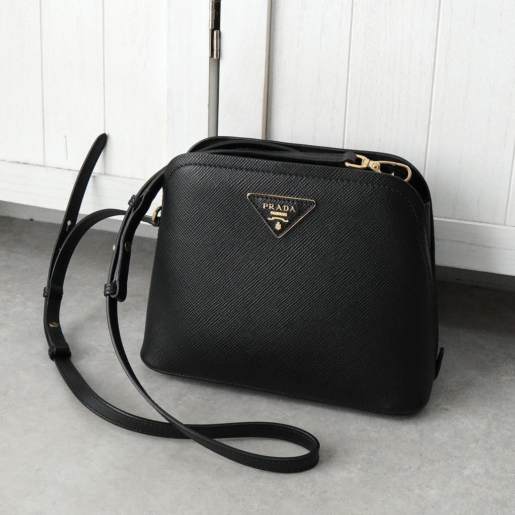 Prada Saffiano Leather Shoulder Bag with Triangle Plate and Triangle Logo in Black