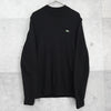 Lacoste 黑色立领针织衫，配徽标贴片
