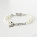 ヴィヴィアン ウエストウッド オーブ ラインストーン フェイクパール シルバー - NEWSED