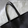 Valentino 徽标黑色皮革托特包