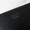 Prada nylon bifold wallet with triangle logo in black