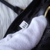 Prada 尼龙和 Saffiano 皮革托特包，带黑色和金色三角形徽标