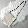 Jil Sander Tangle 中号帆布皮革单肩包 Pochette 象牙色 / 黑色