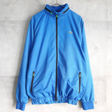 ラコステ ナイロンジャケットトラックジャケット ロゴパッチ ブルー - NEWSED