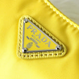 プラダ テスートナイロン / サフィアーノレザー トライアングルロゴ Re - Edition 2005 2WAY ショルダーバッグ ワンショルダーバッグ イエロー - NEWSED