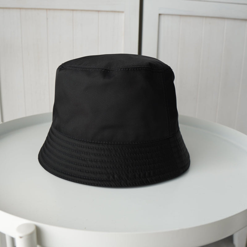 プラダ RE - NYLON ポコノ テスート ナイロン バケットハット 帽子 三角プレート トライアングルロゴ ブラック 保存袋付き - NEWSED