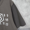 エムエムシックス メゾン マルジェラ カレンダーロゴ フェイクレイヤード Tシャツ カーキグレー レディース