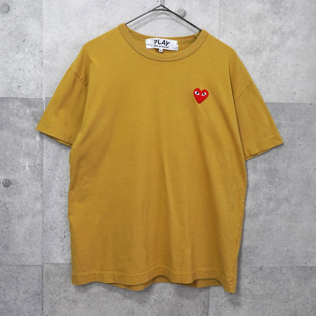 プレイ コムデギャルソン ハートロゴ Tシャツ マスタードイエロー