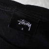 Stüssy 世界巡回赛图案 T 恤（黑色）