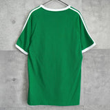 アディダス トレフォイルロゴ リンガーTシャツ グリーン × ホワイト - NEWSED