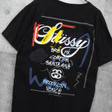 ステューシー ワールドツアー グラフィック Tシャツ ブラック - NEWSED