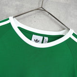 アディダス トレフォイルロゴ リンガーTシャツ グリーン × ホワイト - NEWSED