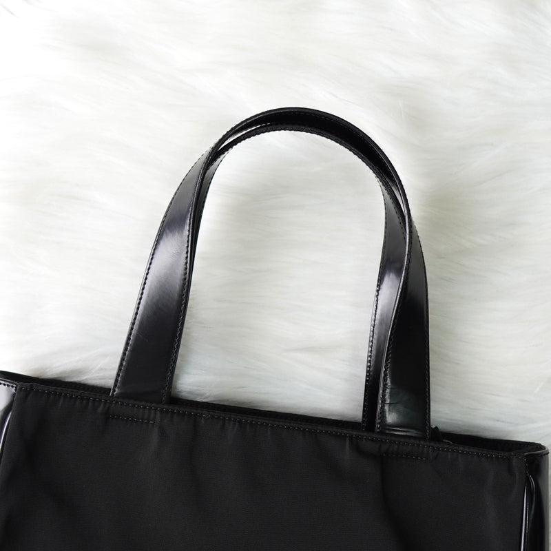 プラダ ナイロン / レザー ハンドバッグ トライアングルロゴ ブラック