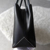 White Stitch Black Leather Hand Bag