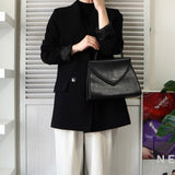 イヴサンローラン ヴィンテージ エンボス YSLロゴ レザー ハンドバッグ 自立型 ブラック - NEWSED