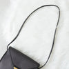 Vintage Yves Saint Laurent YSL logo triangle plate gold PVC shoulder bag pochette black